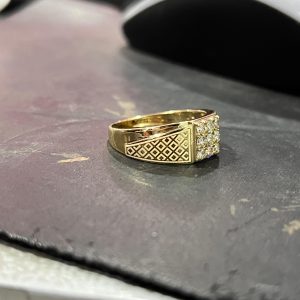 gold jewellery ring on engraving
